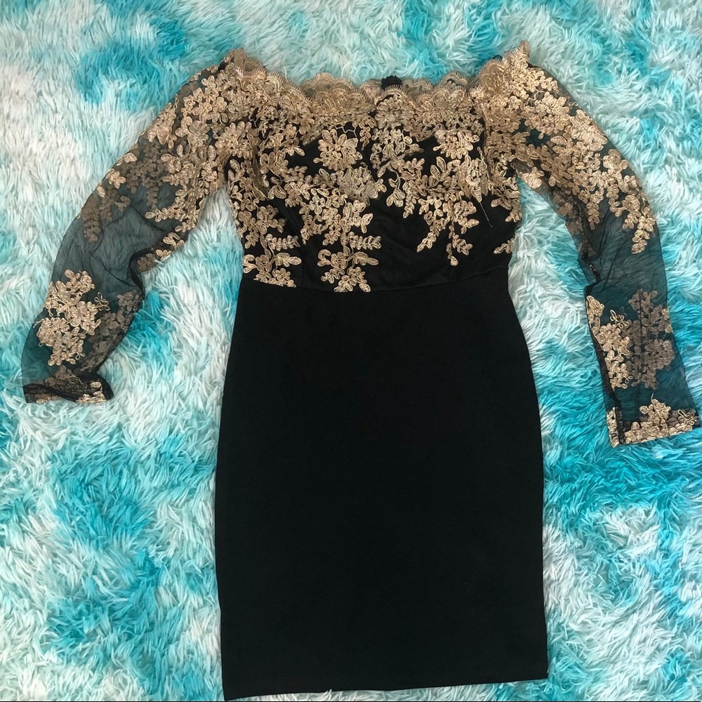 Back and gold lace dress